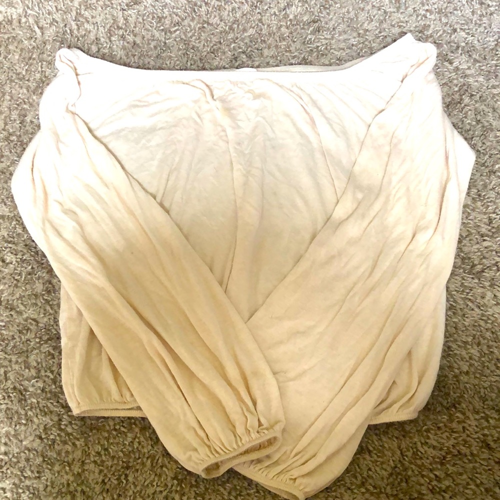 A long sleeve see-through shirt.